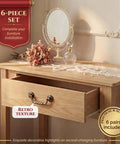4.5 Inch Center Drawer Pulls Six Pack Antique Bronze Bail Drop Handles on oak dresser with decorative accents.