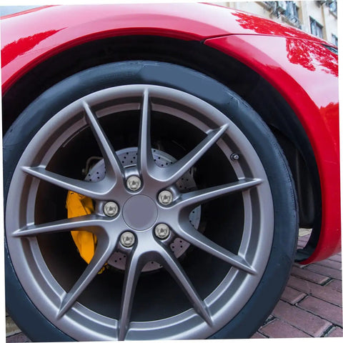 Close-up of car alloy wheel with brake disc, showcasing Alloy Wheel Hub Flange Bolts And Nuts Kit For ATV And Go Kart Easy Install