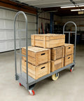 Heavy Duty 2000 Lb Platform Cart With Rails, 60.5 Inch Flatbed Workhorse For Warehouses And Garages, Rust Resistant Steel Frame, High Capacity Rolling Cart Built To Stand Up To The Daily Grind, loaded with wooden crates