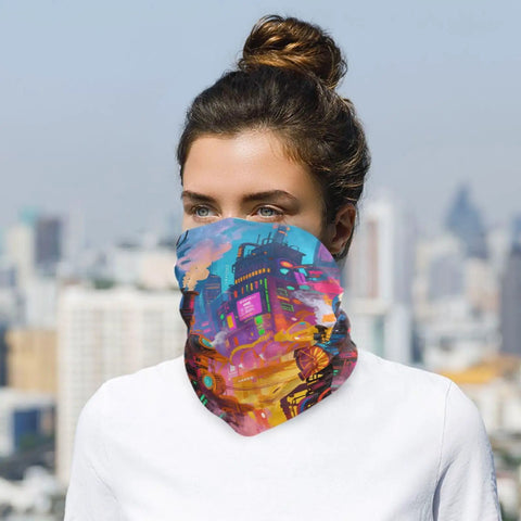 Flex Your Outdoor Setup With This Ultra Breezy Stretchy Neck Gaiter That Shields You From Blazing Sun And Frosty Winds While Keeping You Fresh For Running Or Snowboarding. Colorful printed neck gaiter worn by a person in an outdoor cityscape.
