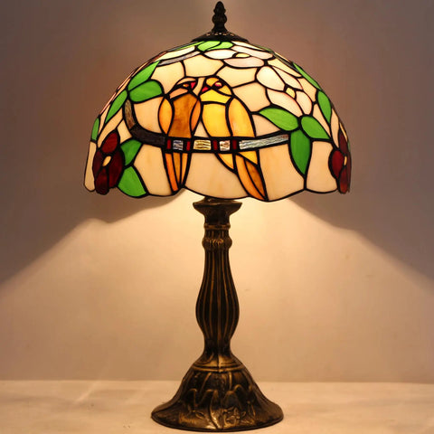 Tiffany Style Stained Glass Table Lamp With Dope Double Tropical Birds on antique bronze base, 12x12x18 inches, illuminated