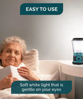 Beast 1500 Lumen Rechargeable LED Lantern With 12000mAh Power Bank on bedside table, soft light, elderly woman reading