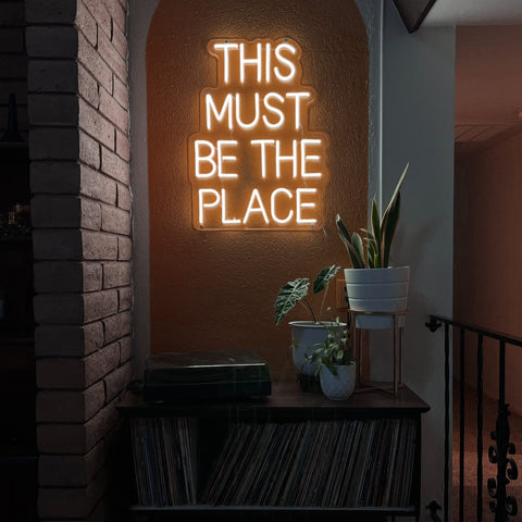 This Must Be The Place Neon Sign Dimmable Light Decor For Bedroom Man Cave Shop Salon Office Decoration Hot Pink Bright Yet Subtle Neon Artwork For Dope Vibe And Cozy Ambience against brick wall