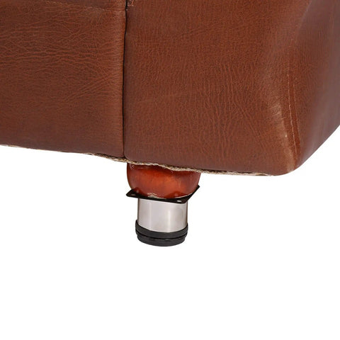 Set Of 4 Adjustable Cabinet Legs For Sofas And Furniture, 304 Stainless Steel Feet attached to a brown sofa corner for stability