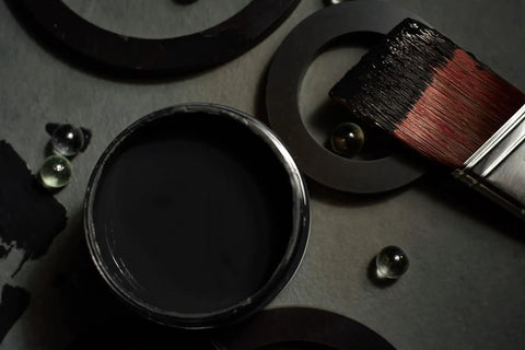 Open can of Chalk Mineral Furniture Paint Matte Black Caviar 16oz with brush for DIY makeovers on wood, metal, plastic.