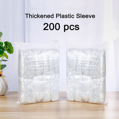 Disposable Arm Sleeve Covers 200 Pack Clear Plastic Sleeves in packaging displayed on wooden table