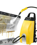 This Badass 3000W High Pressure Steam Cleaner Is A Total Game Changer For Deep Cleaning Your Home And Detailing Your Car Like A Boss spraying a greasy kitchen hood.