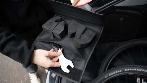Tool pocket of Flipstand Compact Bike Stand With Tool Storage, Saddle Protector And Handlebar Stabilizers For All Bike Types.