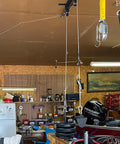 Ceiling Mount Gym Pulley System Stand With Preinstalled Pulleys For DIY Home Gym Or Garage LAT Pulldown And Squat Rack Attachment 16 Inch Hole Spacing installed in garage.