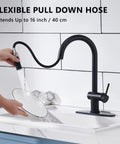 Matte Black Kitchen Faucet With Pull Down Sprayer, Modern Stainless Steel One-Handle Sink Faucet in use, single hole mount.