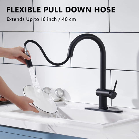 Matte Black Kitchen Faucet With Pull Down Sprayer, Modern Stainless Steel One-Handle Sink Faucet in use, single hole mount.