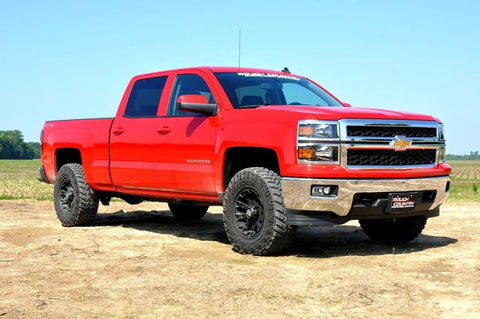 Red Chevy 1500 with 2 Inch Red Aluminum Leveling Kit For Chevy And GMC 1500 2007 To 2018 Level Front To Rear Beefed Up Ground Clearance