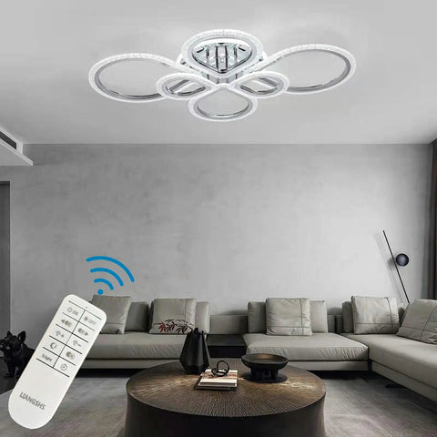 Living room with Six Ring LED Ceiling Light Fixture with Remote Control, Dimmable 3000K-6500K, polished chrome finish.