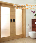 Interior double doors with recessed flush pull handles installed, black, zinc alloy, ergonomic design, in a modern bathroom.