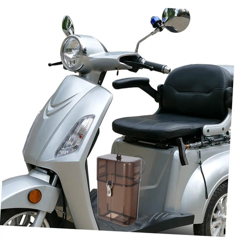 Rock Solid Waterproof Charger Cover For Electric Bike And Ebike Plug Protector Hood next to silver scooter with black seat.