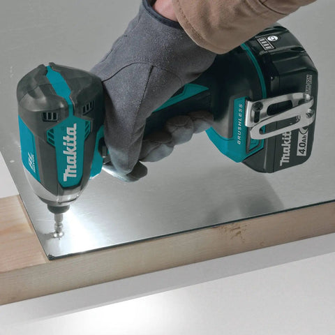 Powerhouse 18V LXT Brushless Cordless Impact Driver Kit With 4.0Ah Battery in use on wooden panel