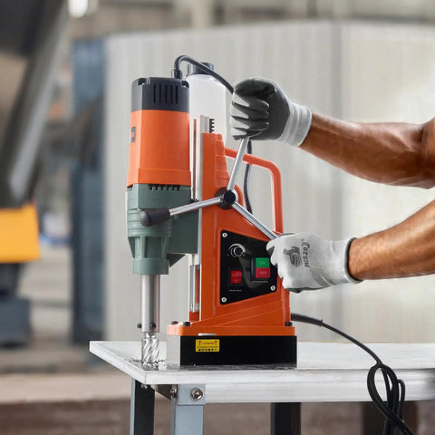 Powerful 1550W Magnetic Drill Press with 0-550 RPM variable speed drilling into metal surface in industrial setting