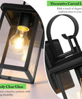 Premium Black Outdoor Wall Light Fixtures Built Different For Any Season Porch Sconces with clear glass and curved loop detail.