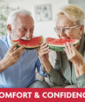 Seniors enjoying watermelon, showcasing All Day Hold Denture Adhesive Seals for Uppers in Fresh Mint, Zinc Free, 30 Count Pack.