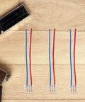 Universal 4 Pack Motorcycle Wiring Harness Kit with copper wires and plastic connectors for quick plug and play install.