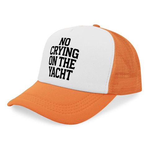 Orange and white trucker cap with 'No Crying On The Yacht' text, mesh back, and curved brim.