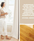 Woman standing by window holding cup, showcasing Straight Up Slick Hardwood Floor Polish In A Compact 27 Oz Bottle.