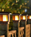 Four Six Pack Cord Free Solar Fence Post Lights Outdoor Solar Powered Post Cap Lights with High Brightness on wood posts