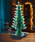 3D Christmas Tree Soldering Kit With LED Flashing Lights In 7 Colors Dope DIY Electronics Project For Learning STEM on table