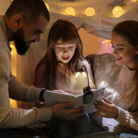 Family using Clip On LED Book Light With Charger And Travel Case Covers Both Pages Warm White Reading Light for reading