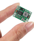 Person holding Six Pack MP1584 EN DC To DC Buck Converter Module Adjustable Voltage Step Down Power Supply 3A Output Input 4.5V To 28V
