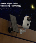 Solar Powered Wireless Outdoor Security Camera With 365 Day Power PIR Motion Detection Alarm Alerts SD Card Slot Two Way Audio 2.4G WiFi 5000mAh Battery For Year Round Surveillance mounted on a wall with solar panel at night.