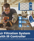 Rock Solid 360 Degree Intake Air Filtration System With 1350 CFM Vortex Fan Built Ionizer No Fuss Woodworking Shop Dust Collector Garage Cleaner And Home Workshop Spotless Solution in use by a woodworker.