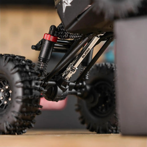 Heavy Duty Stainless Steel Drive Shafts For Redcat Ascent 18 Apex with reinforced suspension components and rugged tires.