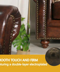 Top Notch Antique Brass Upholstery Tacks For Furniture 100 Pack Decorative Nail Heads on a vintage leather sofa.