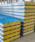 Pro Grade EPS Sandwich Panel Roll Forming Machine With Precision Tension Control For Rock Wool Partition Boards and Portable Room Walls stacked panels.