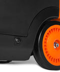 Close-up of the orange wheel of a quiet and lightweight 4800 watt RV ready portable inverter generator with fuel shut off and clean power.