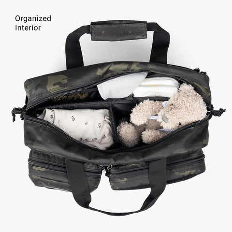 Open Deuce 4th Gen Tactical Diaper Bag For Dads With Included Changing Mat And Stroller Straps Water Resistant 600D Polyester showing interior