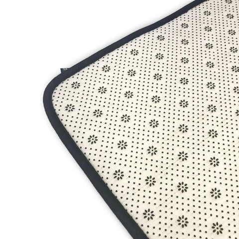Back of Fantasy Farm Tractor Non Slip Doormat 60x39 Inches Low Profile Area Rug showing non-slip material and floral pattern.