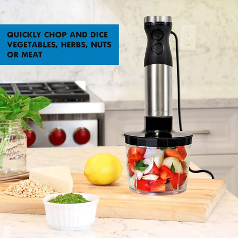 Heavy Duty Hand Blender Set With Variable Speed Twist Dial And Maximum Turbo Boost, Four Sharp Stainless Steel Blades, Food Chopper And Whisk Attachment, Total Kitchen Game Changer in use with diced vegetables on chopping board.