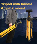 Hella Bright 20000 Lumen Dual Head LED Work Light with Stand showing folded yellow telescoping tripod with handle at night backdrop