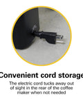 Close-up of compact 1 cup coffee maker for office use showing the cord storage feature.
