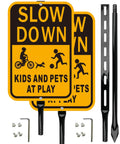 Slow Down Kids At Play Safety Signs in yellow and black reflective aluminum, 14x10 inches, with 36-inch stakes for driveways.