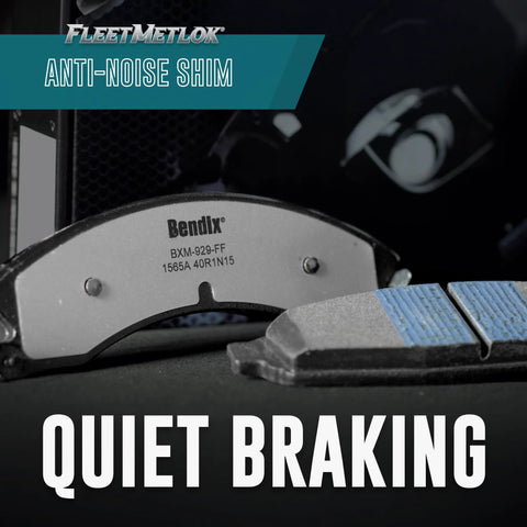 Bendix front brake pad with anti-noise shim, close-up view
