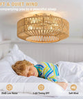 Whisper Quiet Boho Caged Rattan Fandelier Ceiling Fan with Bright Integrated Lighting, illuminating a sleeping child.