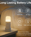 Motion Sensor Night Light Cordless Table Lamp with 2000mAh Battery glowing on nightstand, highlighting long-lasting battery life