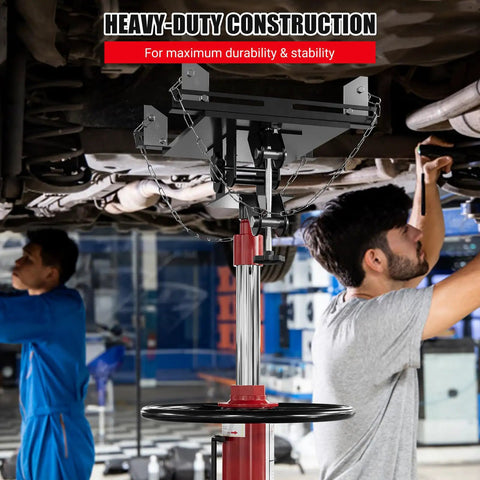 Heavy Duty 1100 Lbs Hydraulic Transmission Jack With 2 Stage Telescoping Arm showing durable construction, supports mechanics in garage for engine swaps.