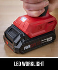 Tough As Nails 20V Brushless Cordless Hammer Drill Kit With Quick Charge Battery And Secure Case holding a compact lithium battery.