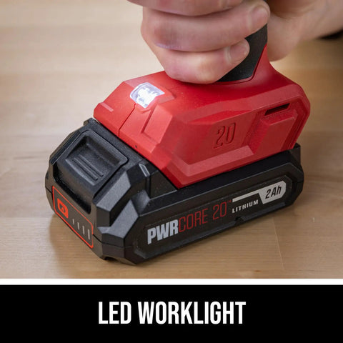 Tough As Nails 20V Brushless Cordless Hammer Drill Kit With Quick Charge Battery And Secure Case holding a compact lithium battery.