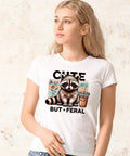 Woman wearing t-shirt with raccoon print from Sixteen Cute Raccoon Iron On Patches For T Shirts Bags And More Ready To Press Heat Transfer Vinyl Stickers Set For DIY Clothing Home Decor And Fabric Projects.