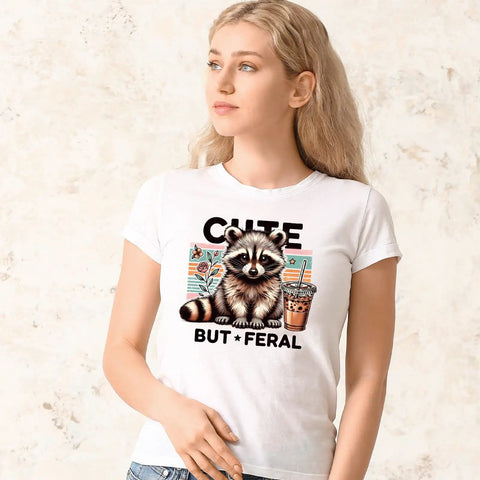 Woman wearing t-shirt with raccoon print from Sixteen Cute Raccoon Iron On Patches For T Shirts Bags And More Ready To Press Heat Transfer Vinyl Stickers Set For DIY Clothing Home Decor And Fabric Projects.